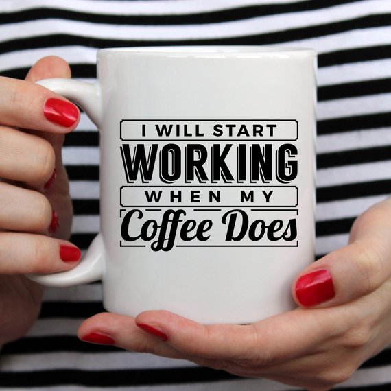 A humorous coffee mug with the phrase 'I Start Working When My Coffee Starts Working', crafted from high-quality ceramic, perfect for coffee lovers.