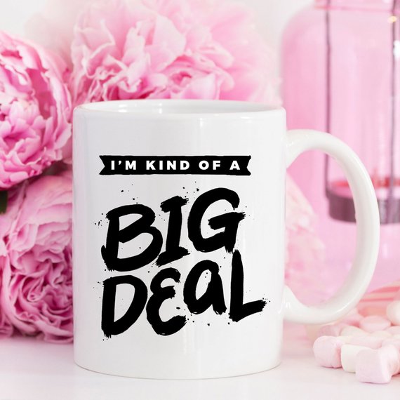 A humorous 11oz coffee mug with the phrase 'I'm Kind Of A Big Deal' printed on it, showcasing a fun and playful design.