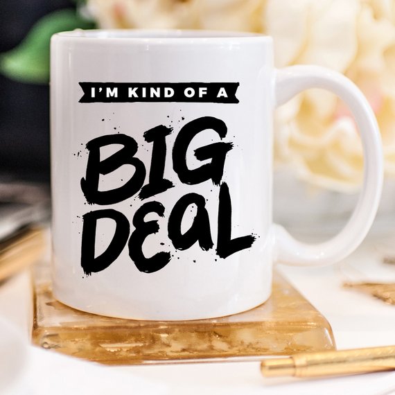 A humorous 11oz coffee mug with the phrase 'I'm Kind Of A Big Deal' printed on it, showcasing a fun and playful design.