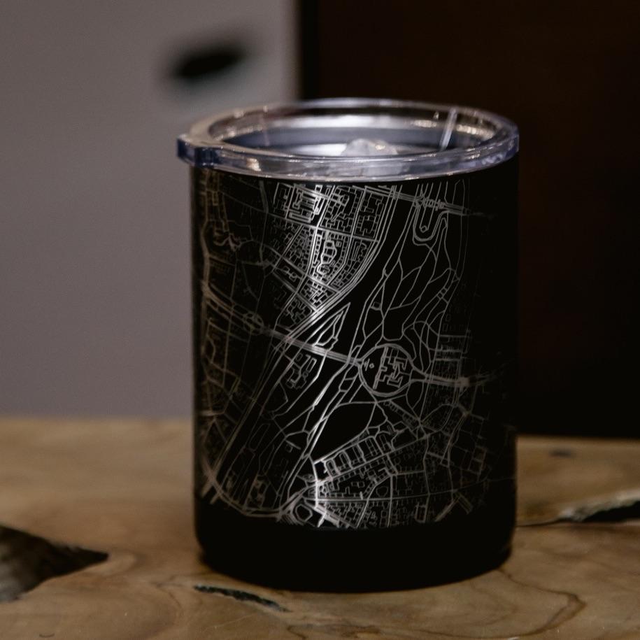 Matte black insulated cup featuring a custom engraved map of Irvine, California with coordinates.