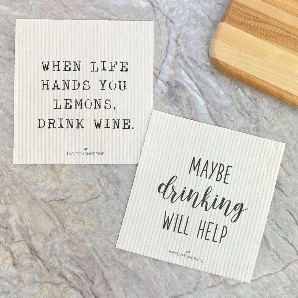 Two Swedish dish cloths featuring a lemon design, made from eco-friendly materials, showcasing vibrant colors and intricate patterns.