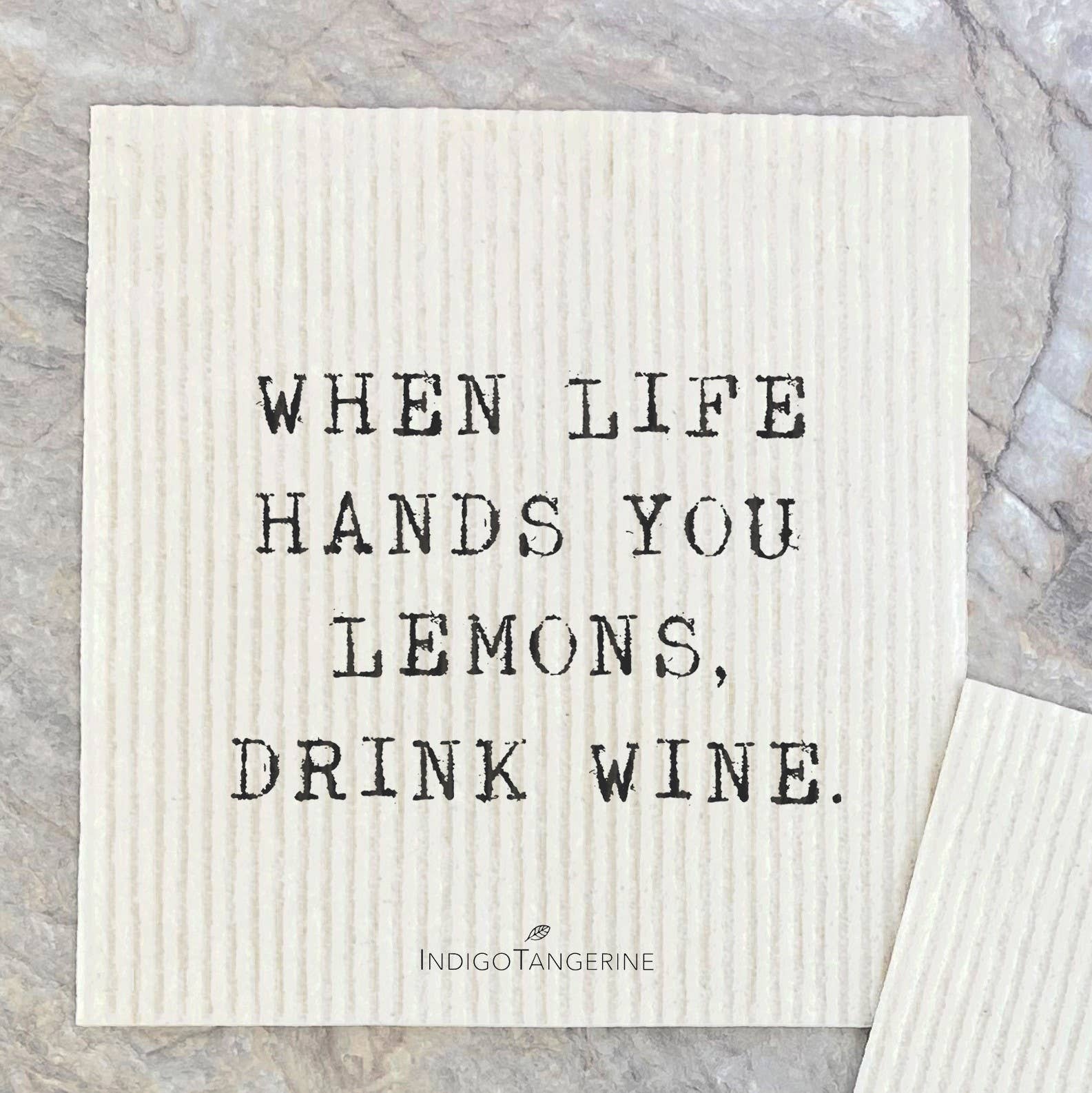 Two Swedish dish cloths featuring a lemon design, made from eco-friendly materials, showcasing vibrant colors and intricate patterns.