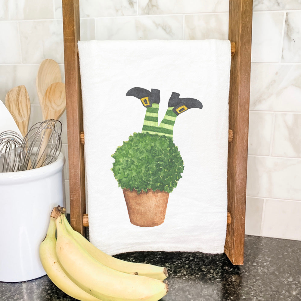 A vibrant cotton tea towel featuring a whimsical leprechaun legs design, perfect for kitchen use and decoration.