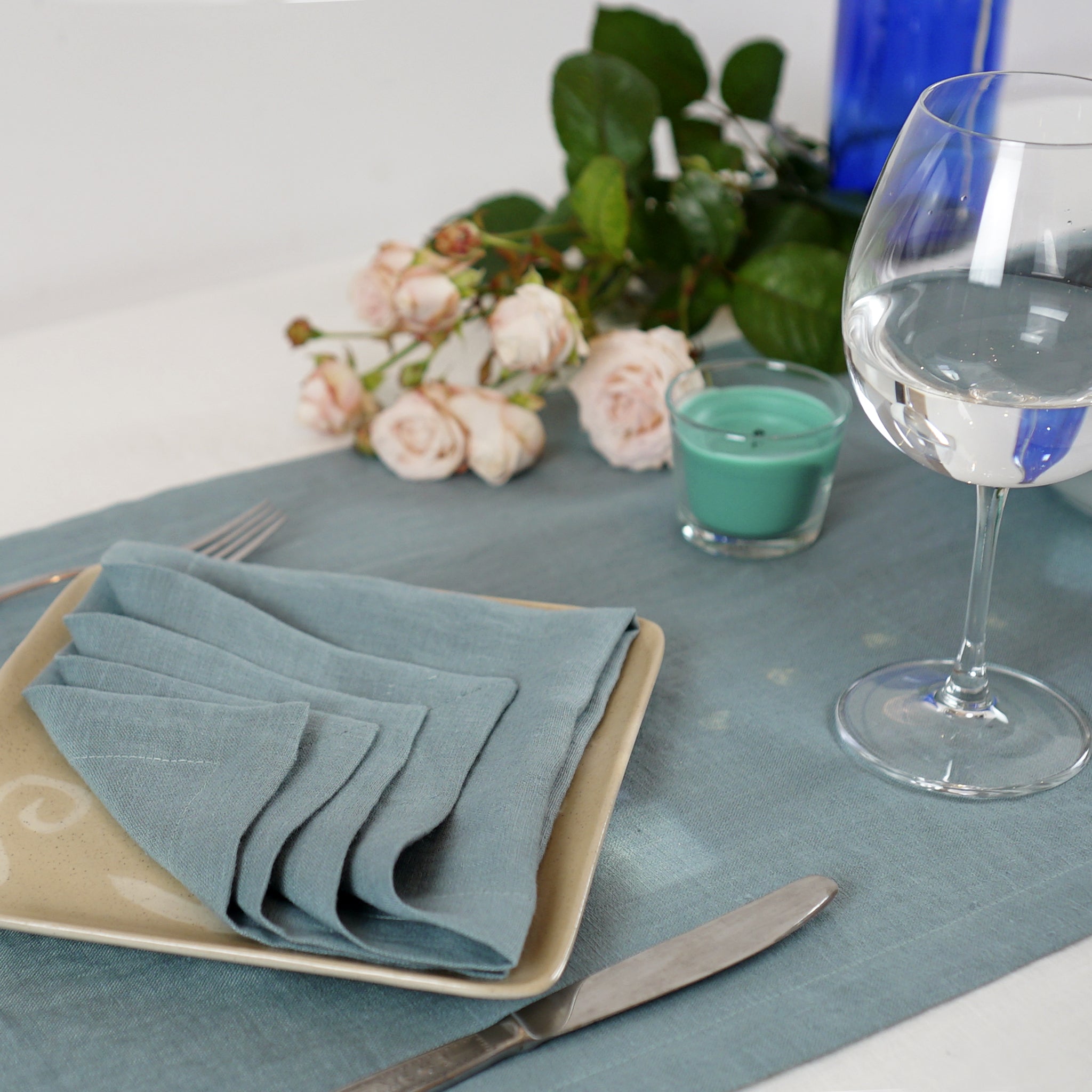 Light Grey linen napkins set, handcrafted from 100% stonewashed linen, featuring a decorative hem and a soft, luxurious texture.