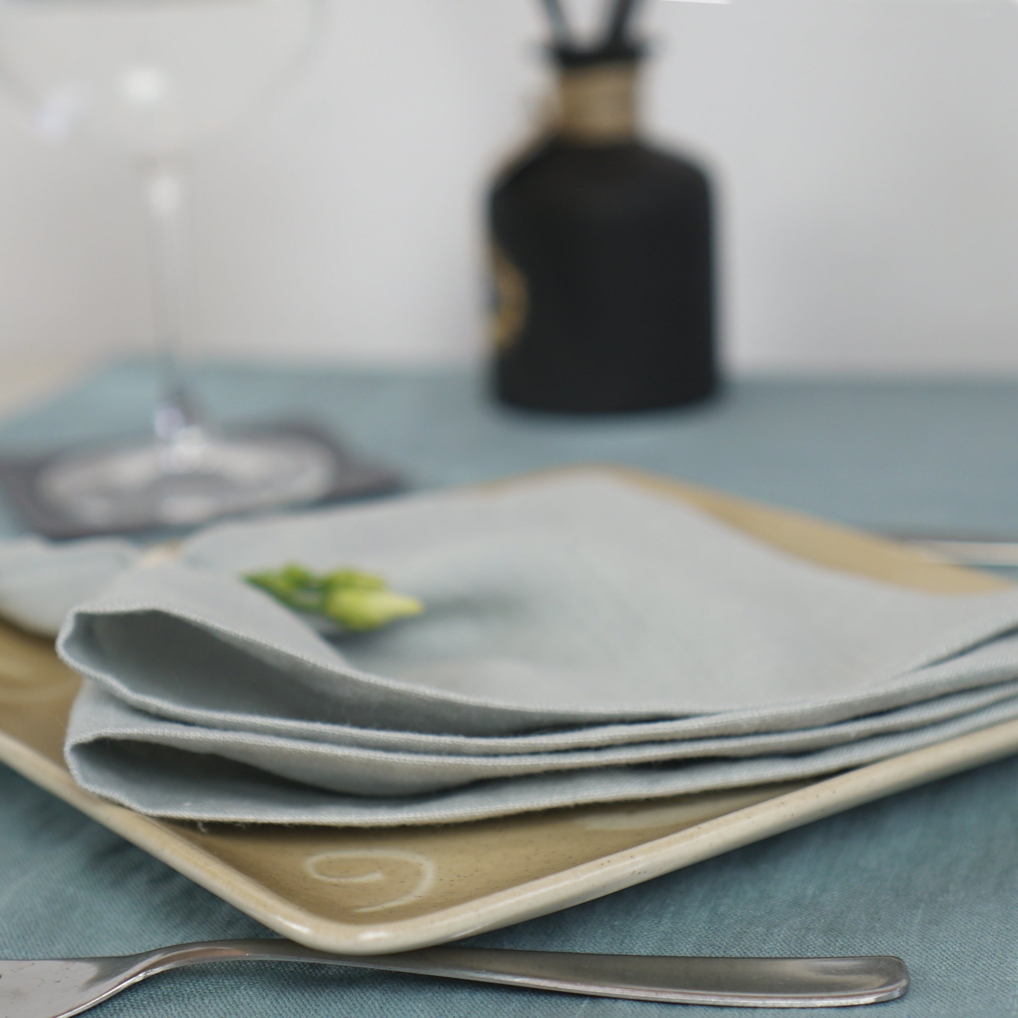 Light Grey linen napkins set, handcrafted from 100% stonewashed linen, featuring a decorative hem and a soft, luxurious texture.