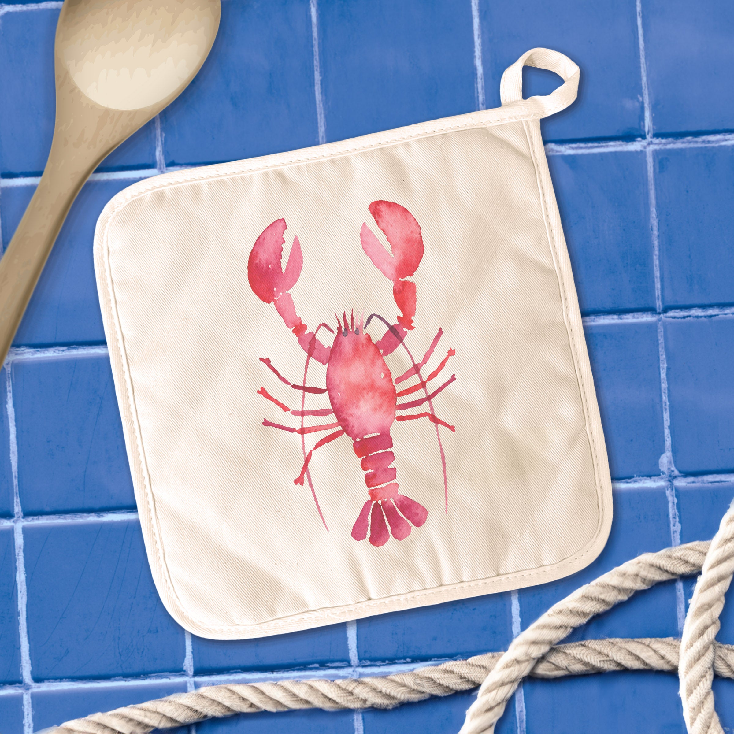 Lobster Cotton Pot Holder featuring vibrant designs and a convenient hanging loop, perfect for protecting surfaces from hot cookware.