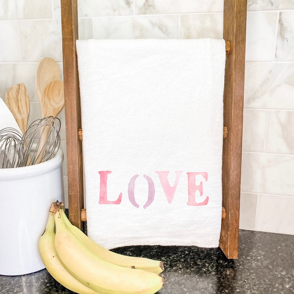 Love Stencil Cotton Tea Towel featuring a vibrant design, made from 100% absorbent cotton, ideal for kitchen use.