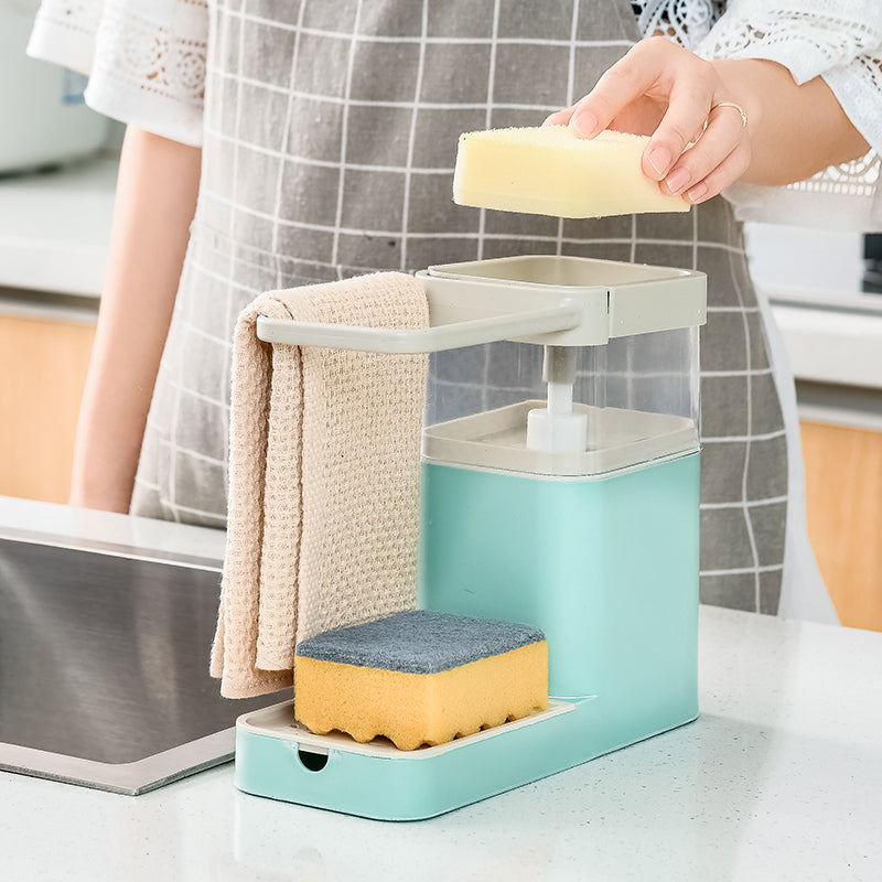 Multifunctional Kitchen Cleaning Combination Rack featuring soap dispenser, sponge holder, and towel shelf in gray, green, and pink colors.