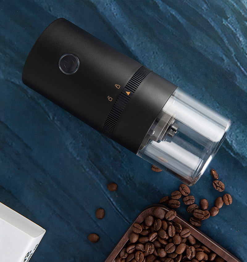 Portable Electric Coffee Grinder with TYPE-C USB, featuring a transparent chamber and adjustable grind settings.