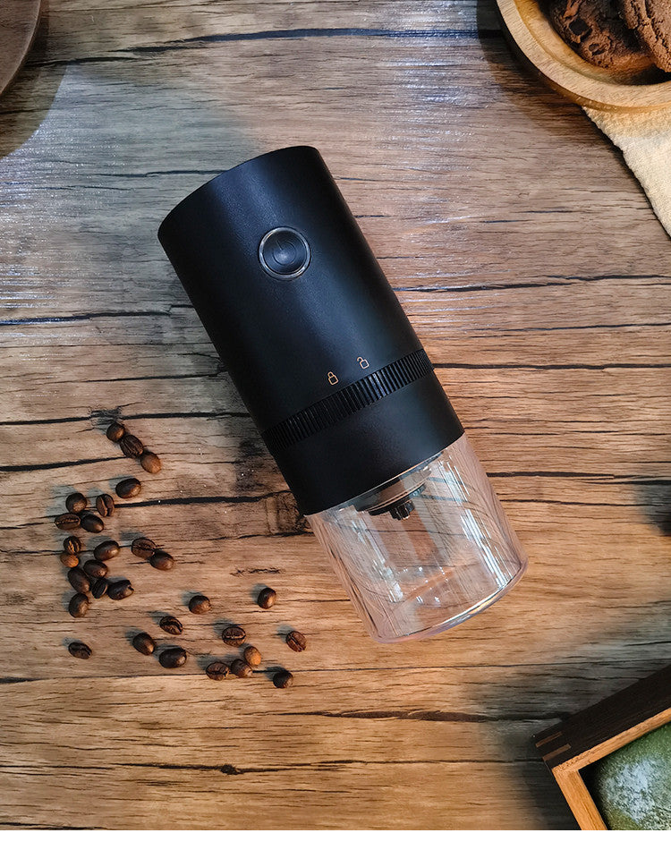 Portable Electric Coffee Grinder with TYPE-C USB, featuring a transparent chamber and adjustable grind settings.