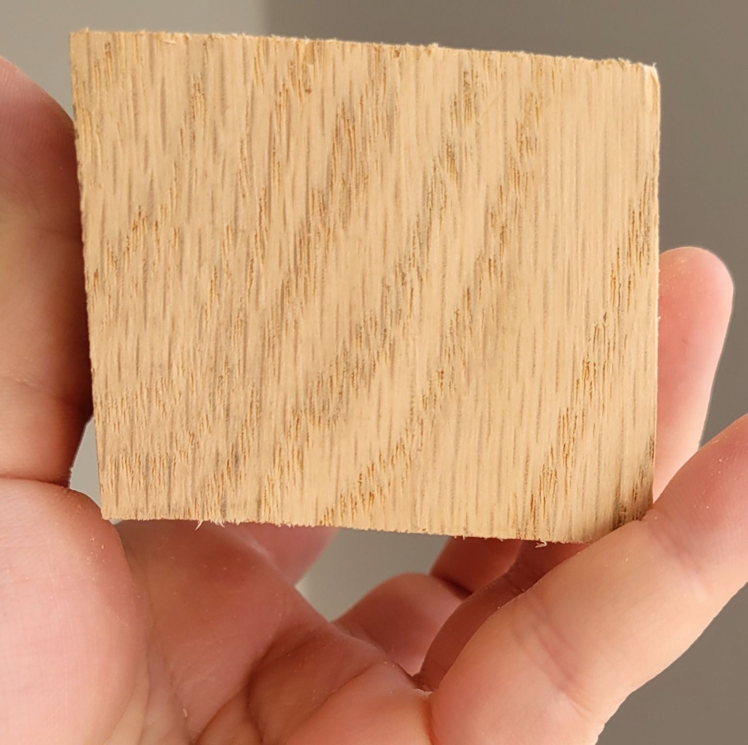 A pack of 30 Oak Grilling Planks, each measuring 5x11 inches, showcasing their rustic texture and natural imperfections.