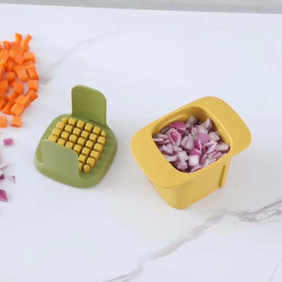 Onion Dicing Artifact, a multifunctional vegetable cutter in yellow and white, designed for easy slicing of onions, carrots, and French fries.