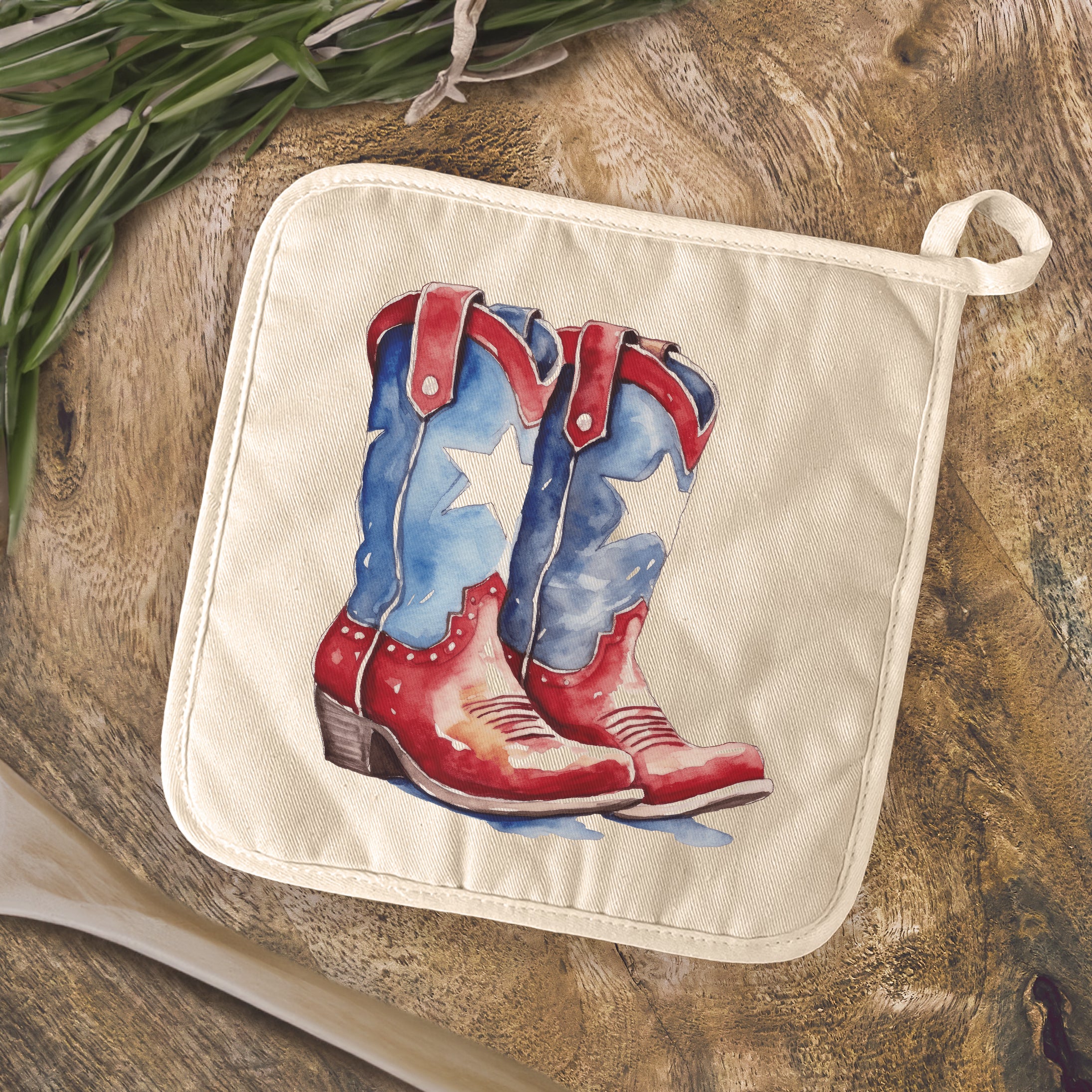Patriotic Cowboy Boots cotton pot holder featuring vibrant designs and a convenient hanging loop, perfect for kitchen use.