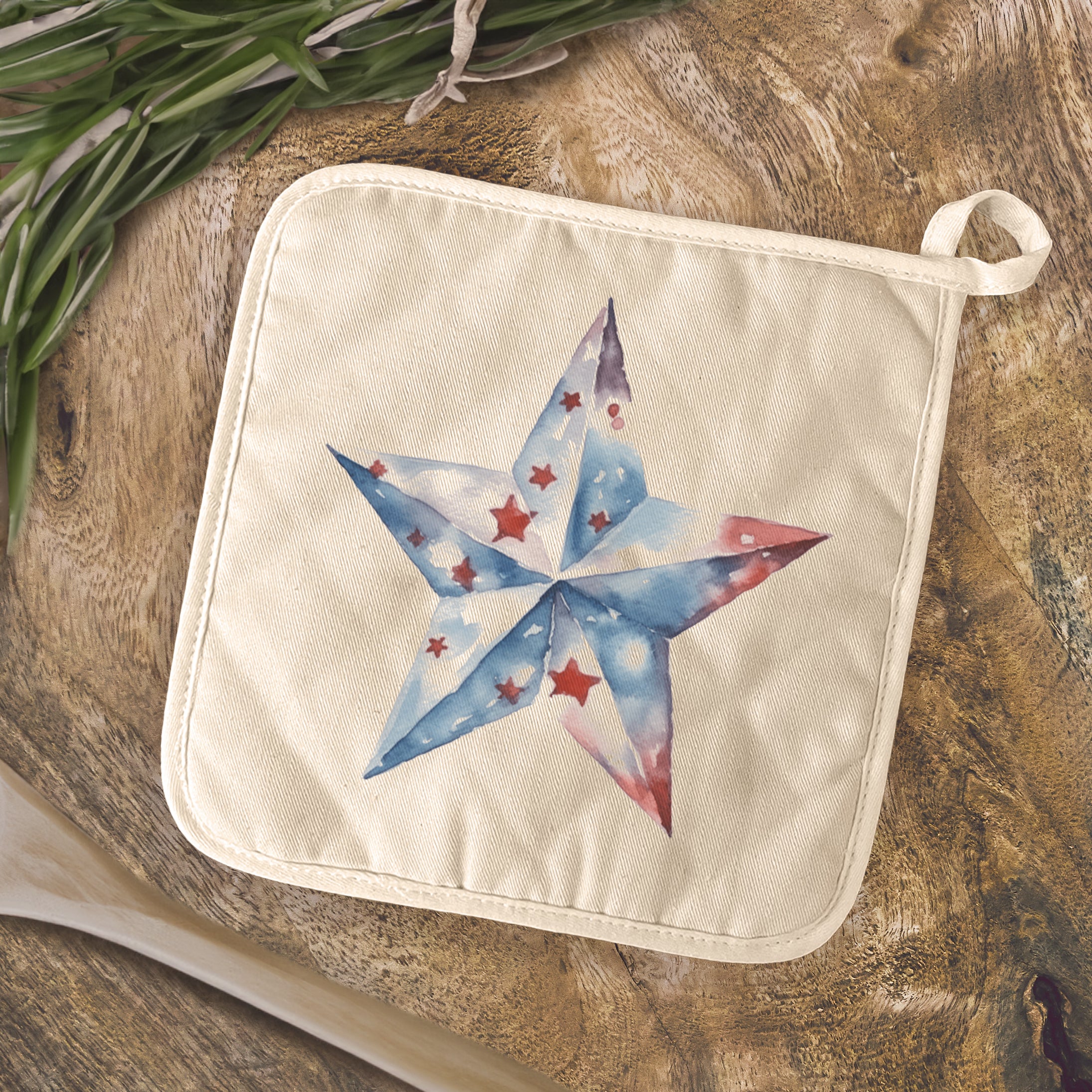 Patriotic Star Cotton Pot Holder featuring vibrant colors and a convenient square shape, ideal for protecting surfaces from hot cookware.
