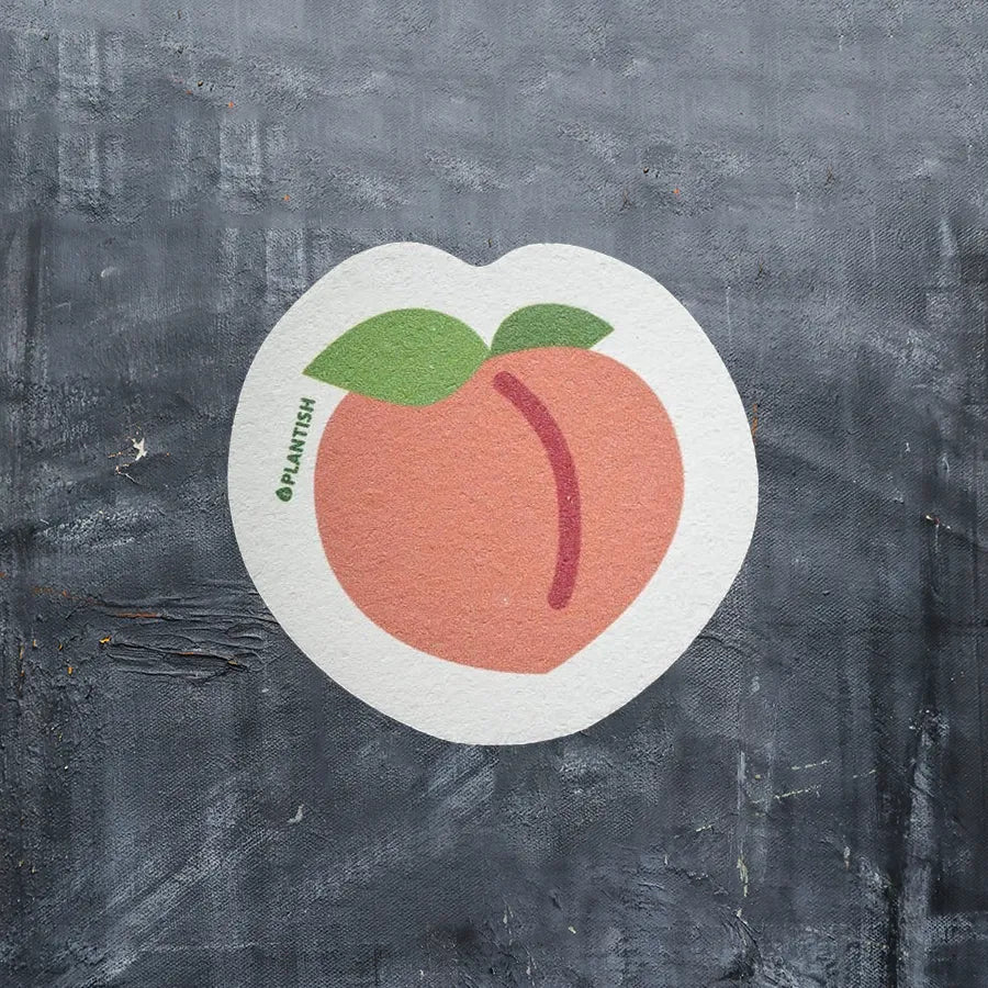 Peach Pop-up Sponge made from 100% vegetable cellulose, eco-friendly and compostable, ideal for kitchen cleaning.