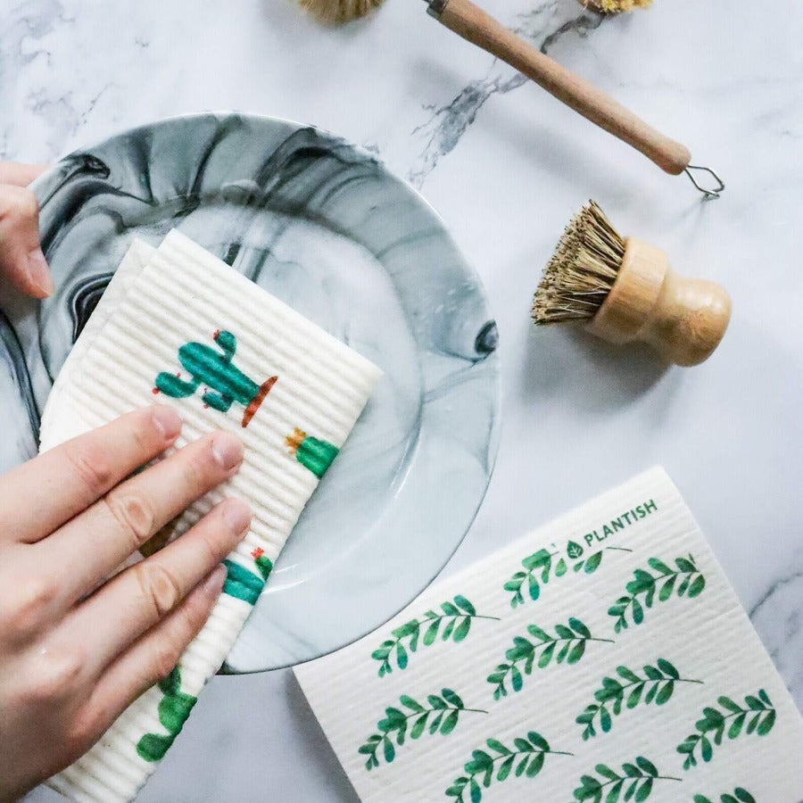 Plantopia Swedish Sponge Cloth in a minimalist design, perfect for eco-friendly cleaning.