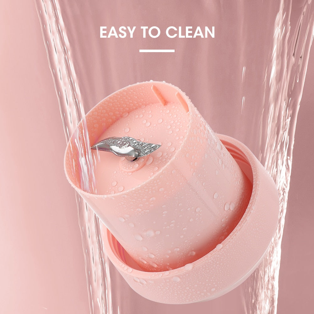 Portable Electric Juicer Cup in vibrant colors with USB charging feature, showcasing its compact design and stainless steel blade.