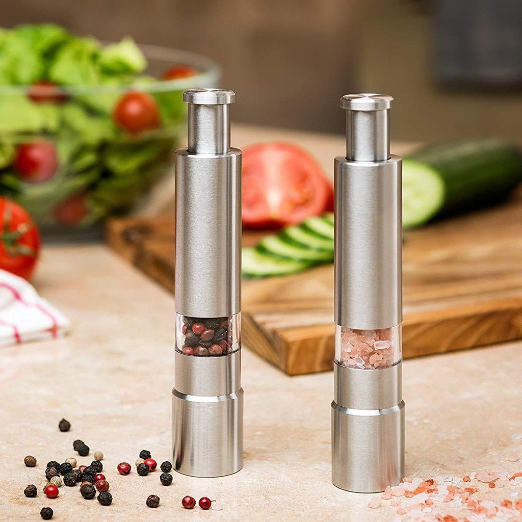 Premium stainless steel salt and pepper spice grinder with a sleek design, perfect for one-handed operation and versatile spice grinding.