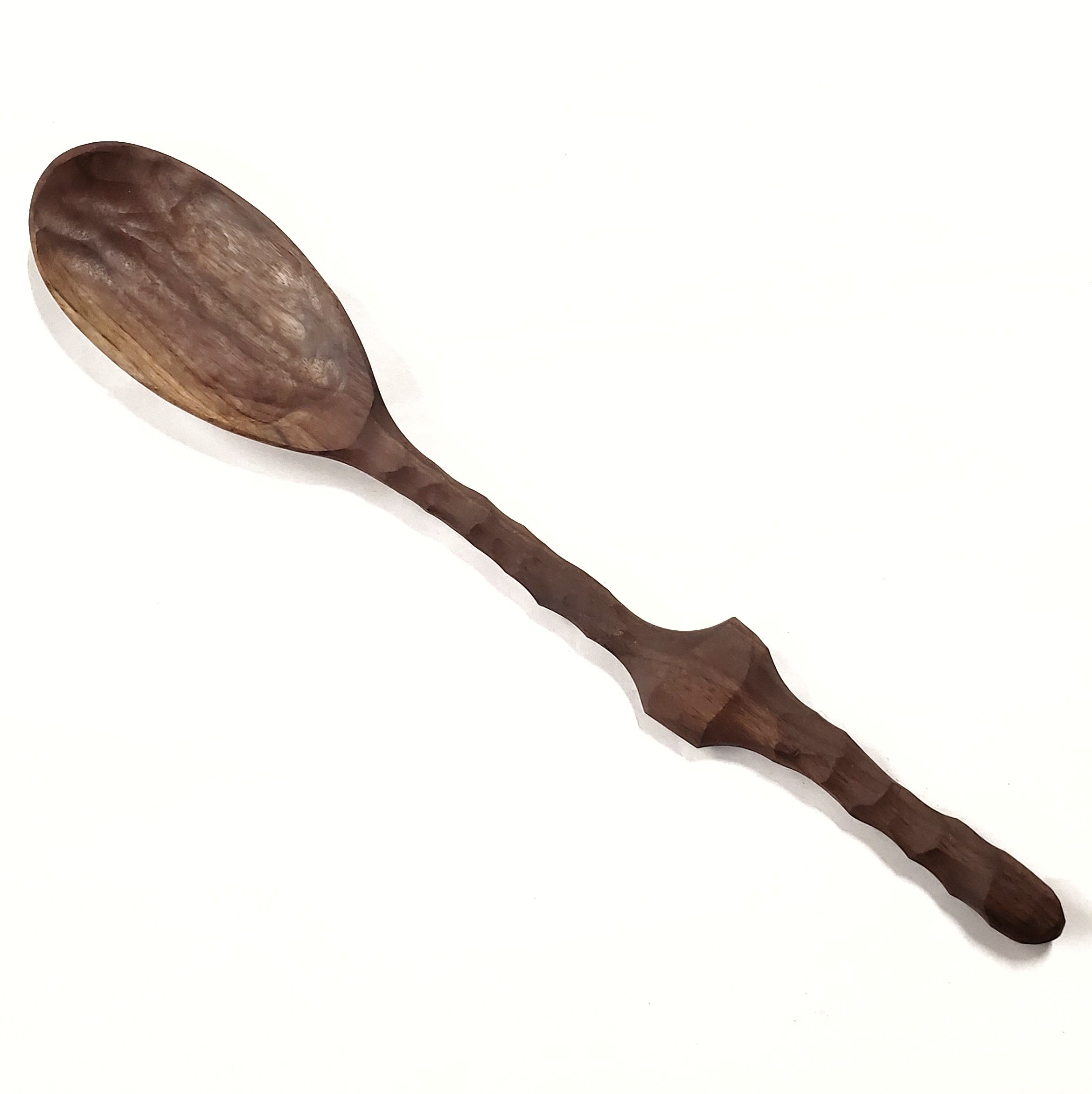 A handcrafted 24-inch Spud Spoon designed for serving large portions of food, featuring a sturdy handle and a large bowl.