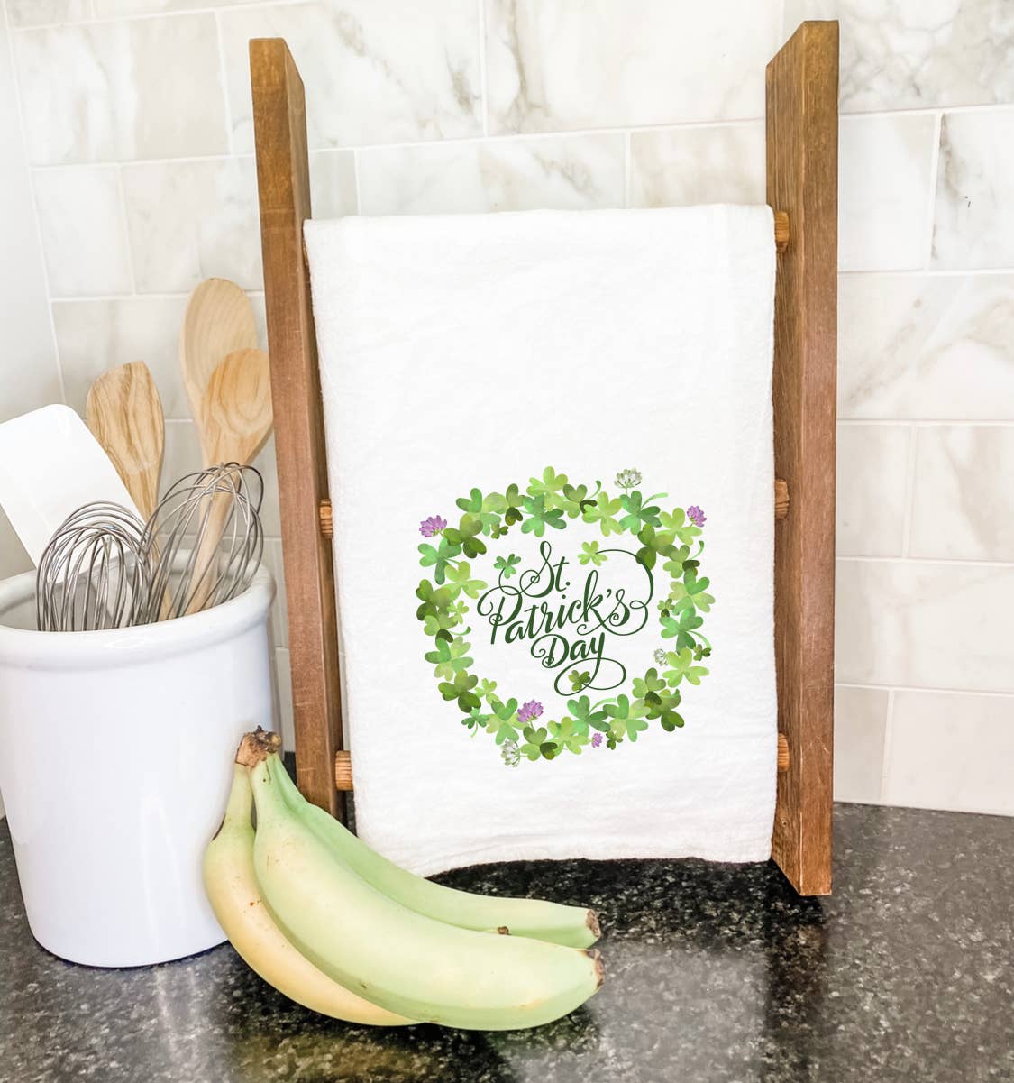St. Patrick's Day Wreath cotton tea towel featuring vibrant green and gold designs, perfect for festive kitchen decor.