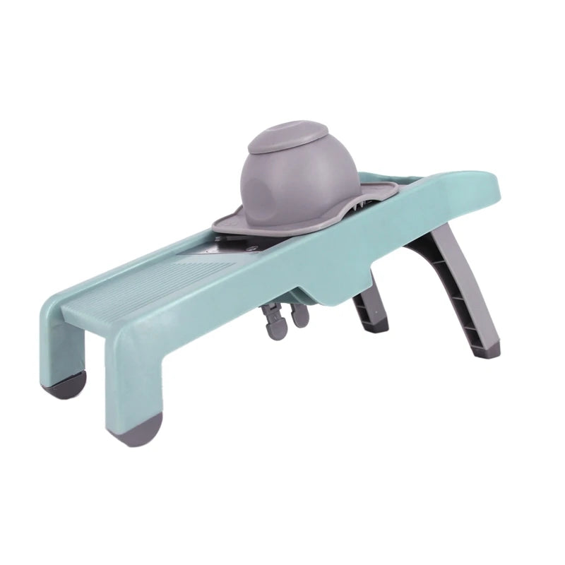 A green stainless steel onion chopper with a vegetable cutter and fixer, designed for easy slicing and dicing of vegetables.