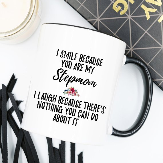 A white ceramic mug designed for stepmoms, featuring a vibrant printed design on both sides, showcasing quality craftsmanship.