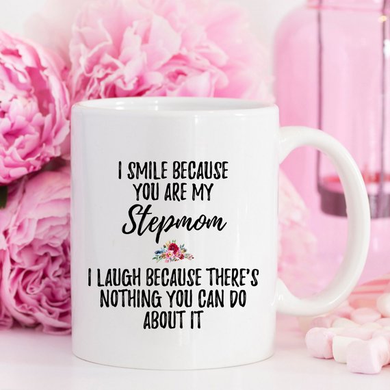 A white ceramic mug designed for stepmoms, featuring a vibrant printed design on both sides, showcasing quality craftsmanship.