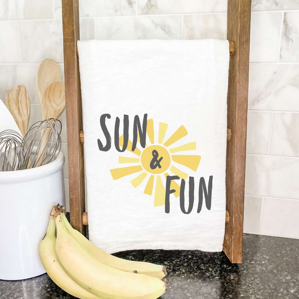 Sun & Fun Cotton Tea Towel featuring vibrant designs, made from 100% absorbent cotton, ideal for kitchen use.