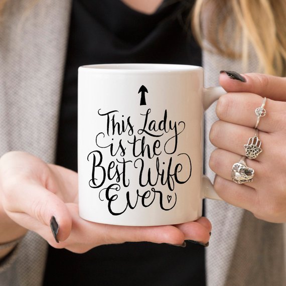 This Lady Is The Best Wife Ever - 11oz Coffee Mug featuring a humorous design, perfect for gifting.