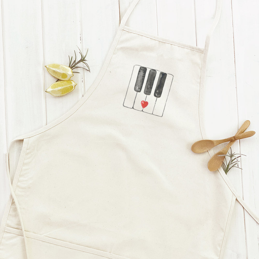 Valentine's Piano Keys Women's Apron featuring a charming design with piano keys motif, made from durable cotton canvas.