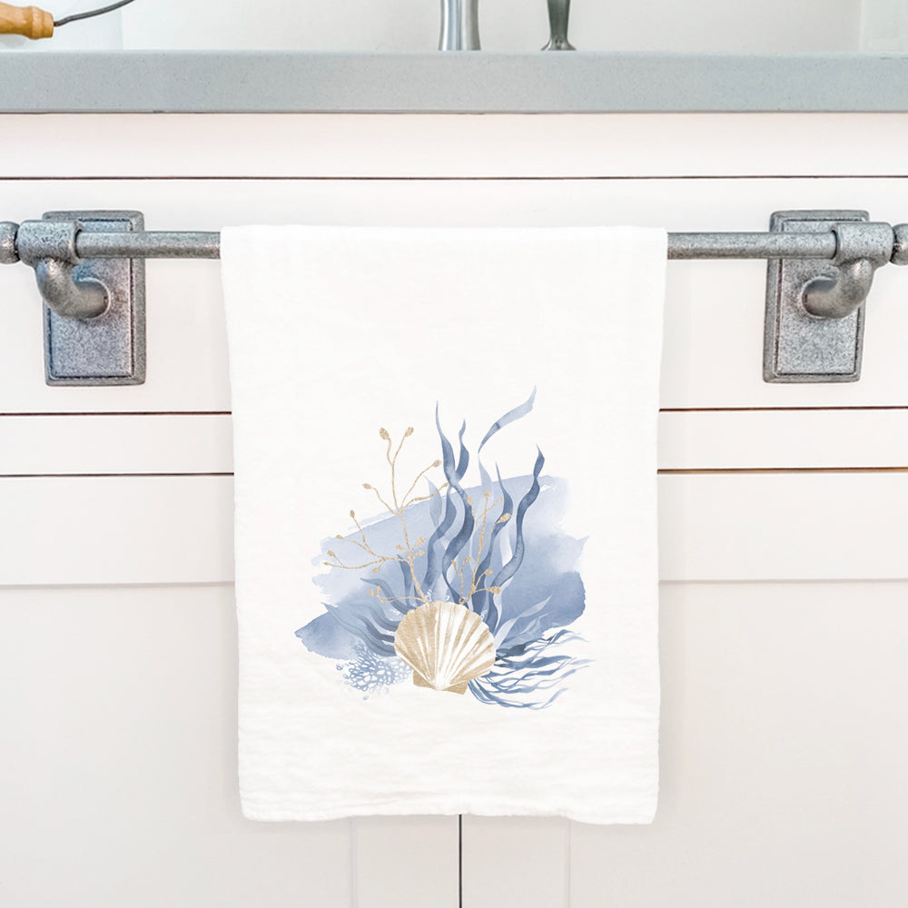 Venus Shell Splash cotton tea towel featuring a vibrant shell design, perfect for kitchen use.