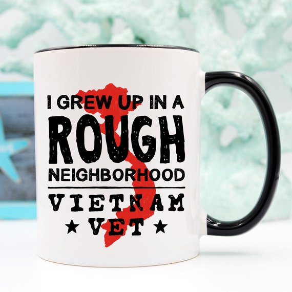 Vietnam Veteran Coffee Mug featuring a humorous design about growing up in a rough neighborhood, crafted from high-quality ceramic.