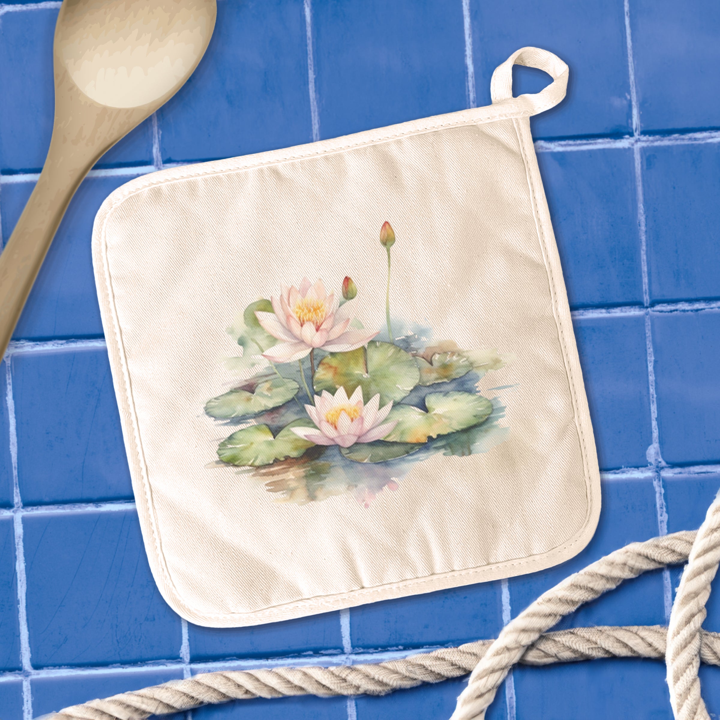A vibrant Watercolor Water Lilies cotton pot holder featuring a beautiful floral design, perfect for protecting surfaces from hot cookware.