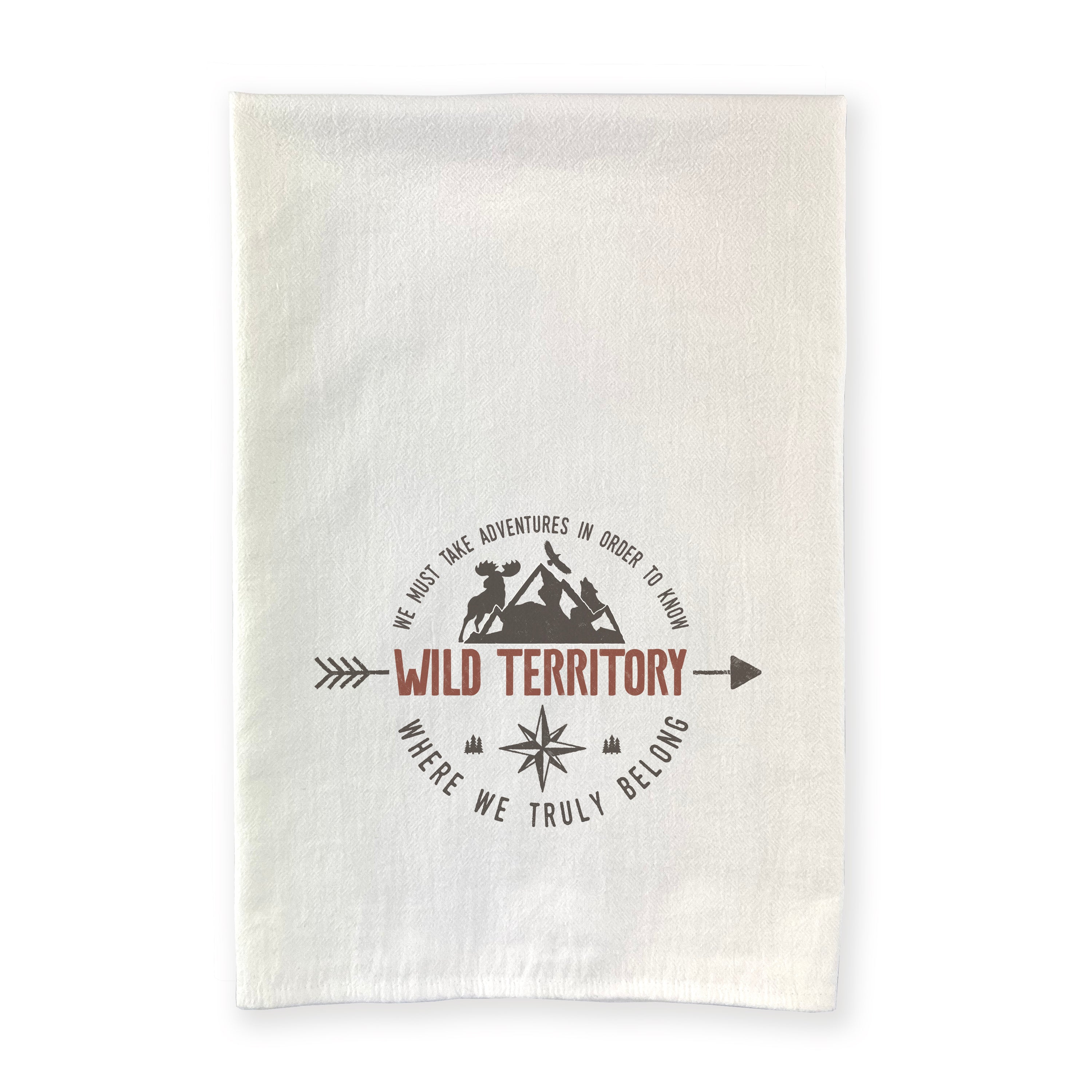 Wild Territory Badge Cotton Tea Towel featuring vibrant design and hemmed edges, perfect for kitchen use.