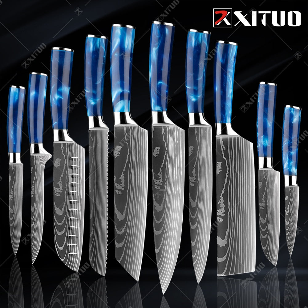 XITUO kitchen knives set featuring blue resin handles and laser Damascus blades, elegantly displayed in a knife holder.
