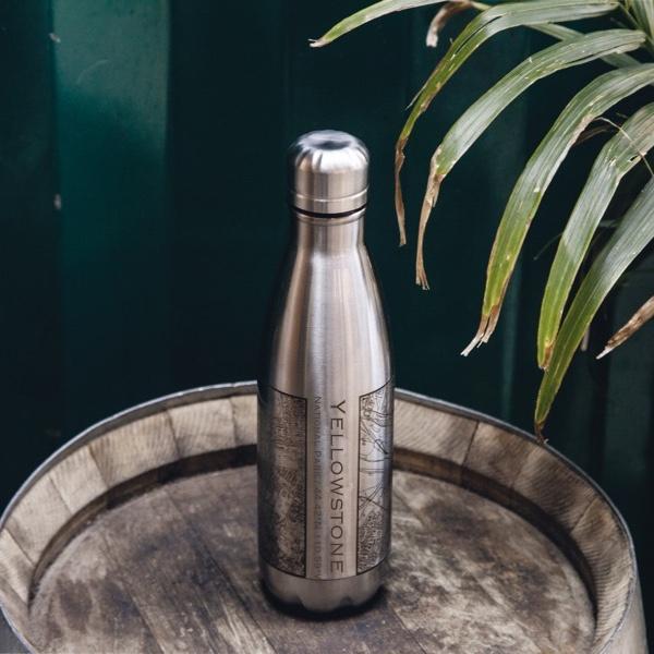 Custom engraved insulated bottle featuring a map of Yellowstone National Park, Wyoming, made of stainless steel.
