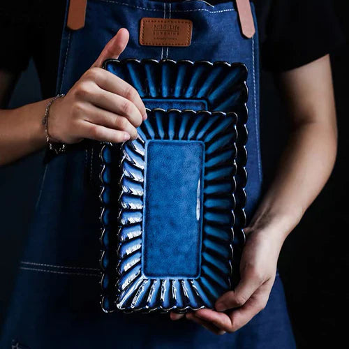 Zurbaa Ceramic Plates Set featuring deep blue color, rectangular shape, and ruffled edges, ideal for serving sushi and sashimi.