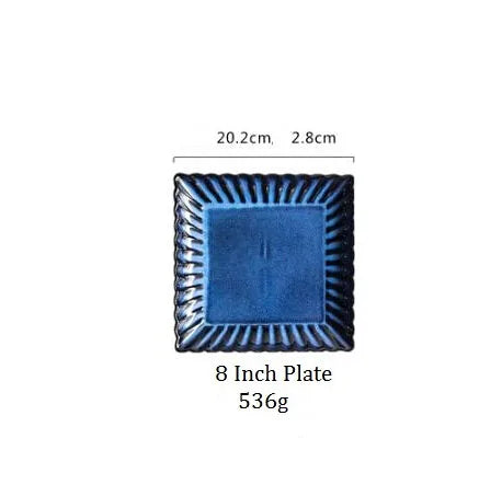 Zurbaa Square Plate featuring deep blue color and ruffled edges, ideal for serving sushi and sashimi.