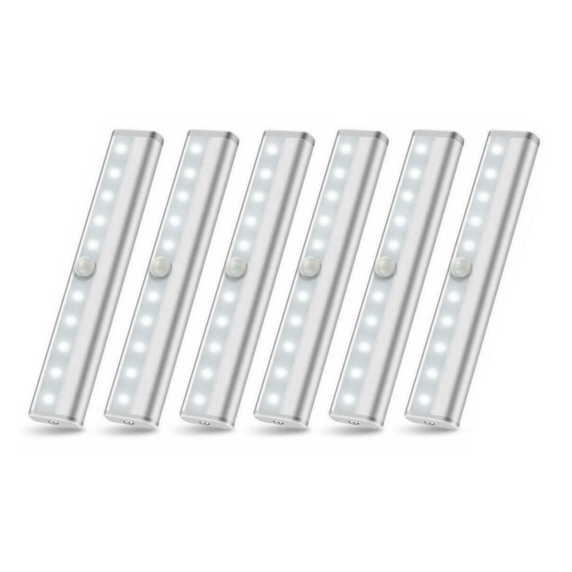 Three LED motion sensor stick-on light bars with adhesive backing, ideal for illuminating dark spaces.