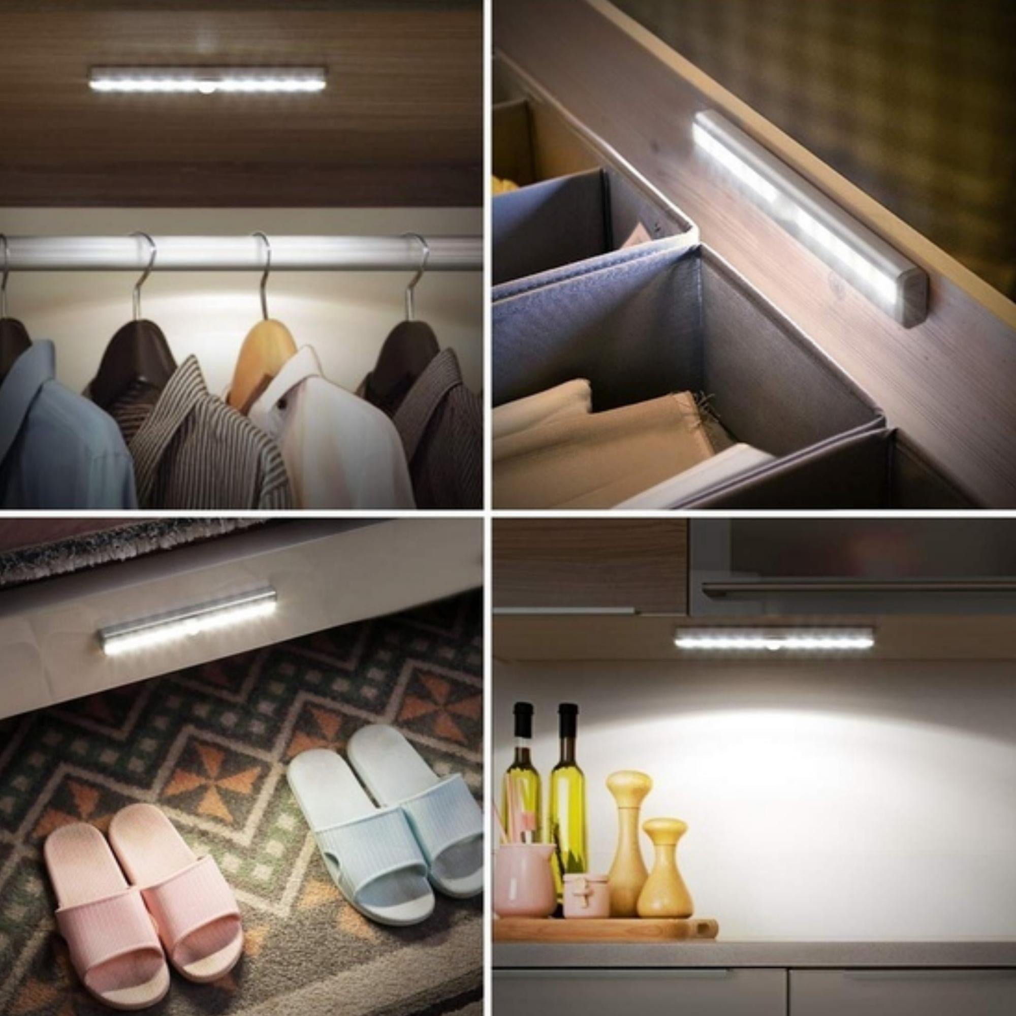 Three LED motion sensor stick-on light bars with adhesive backing, ideal for illuminating dark spaces.