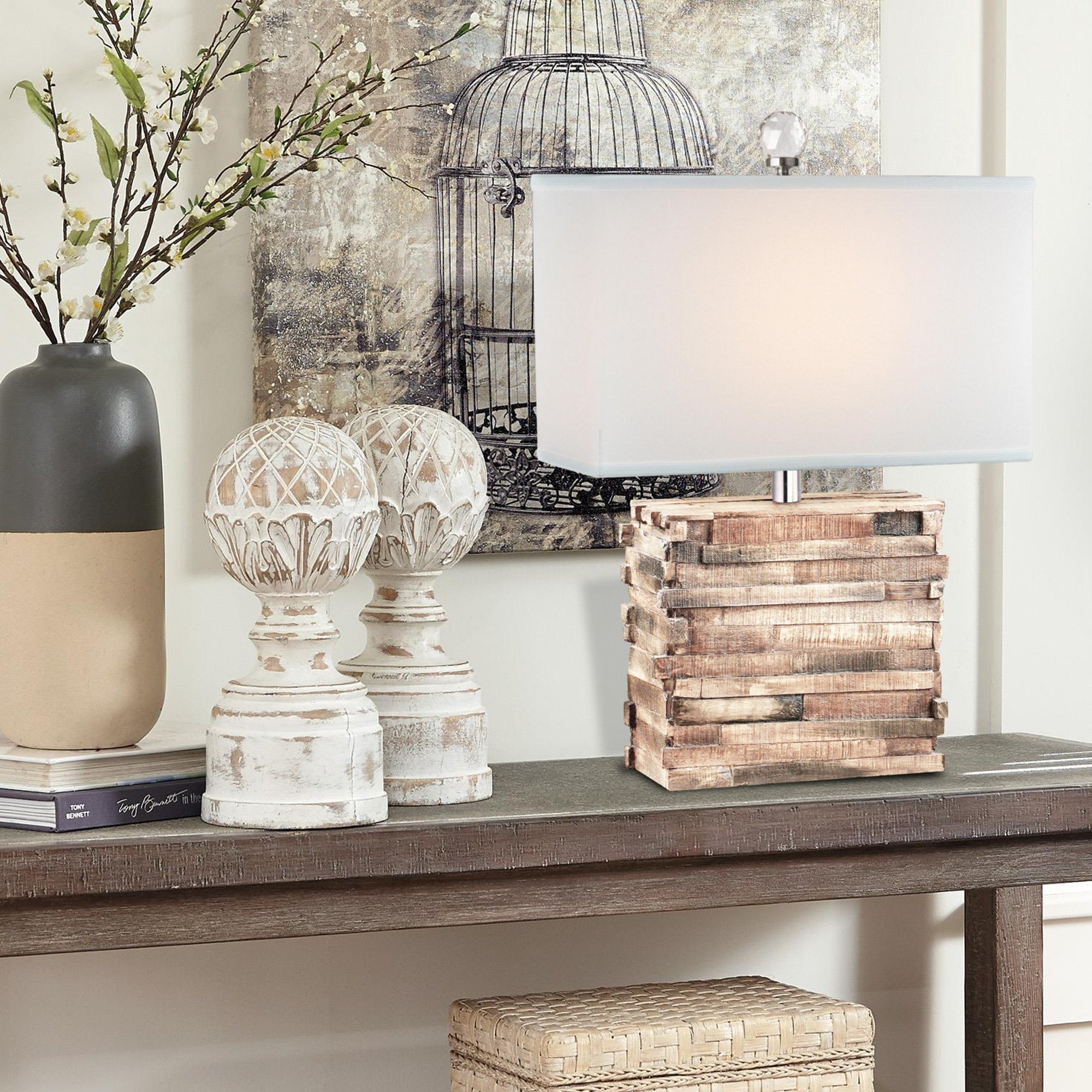 16-inch wide by 11-inch high rectangular drum lampshade made of softback white linen, featuring a spider fitter and durable brass and steel frame.