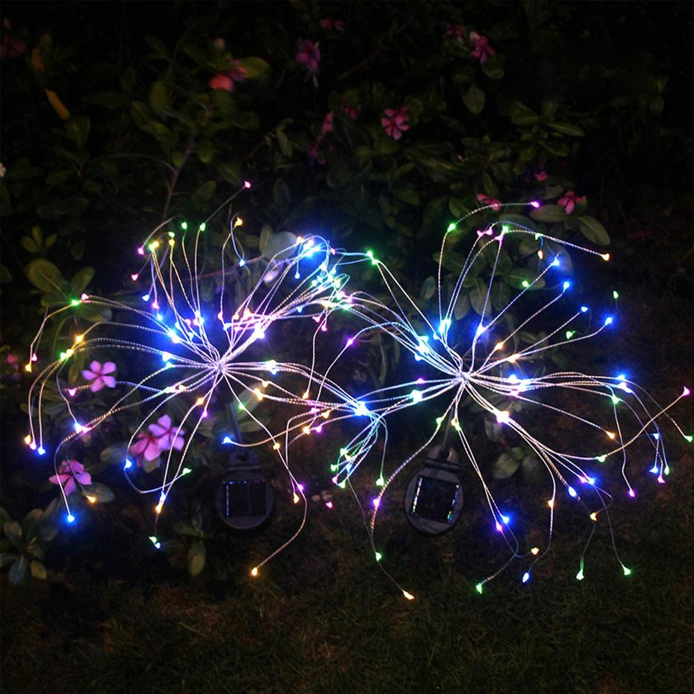 Two solar fireworks lamps with 90 LED lights, showcasing vibrant colors for outdoor decoration.