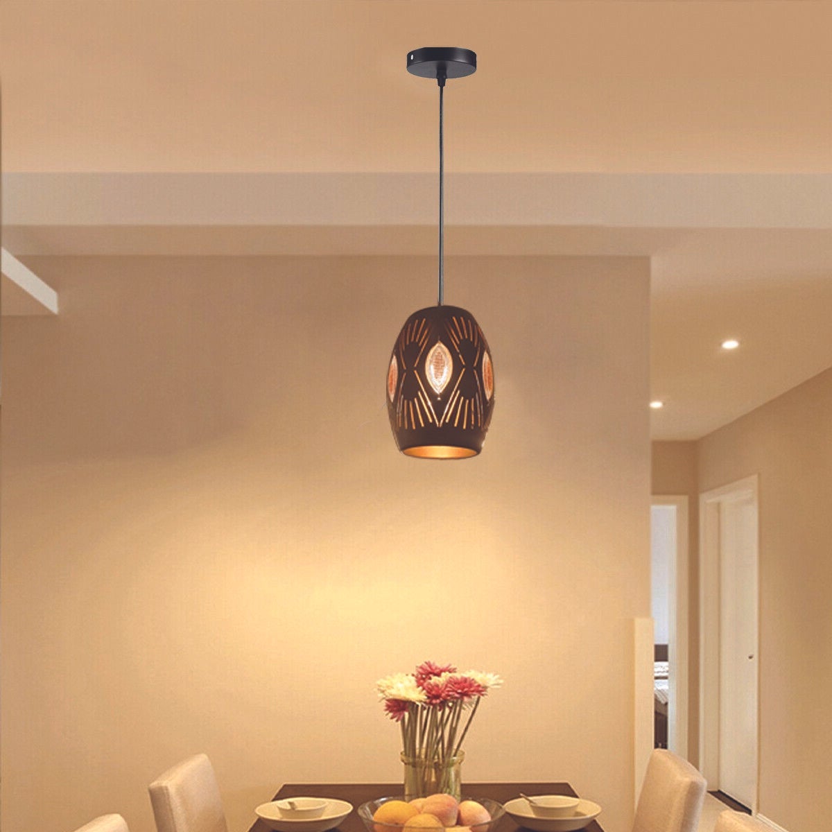 Three elegant black ceiling pendant light fittings with a stylish design, perfect for home and restaurant decor.
