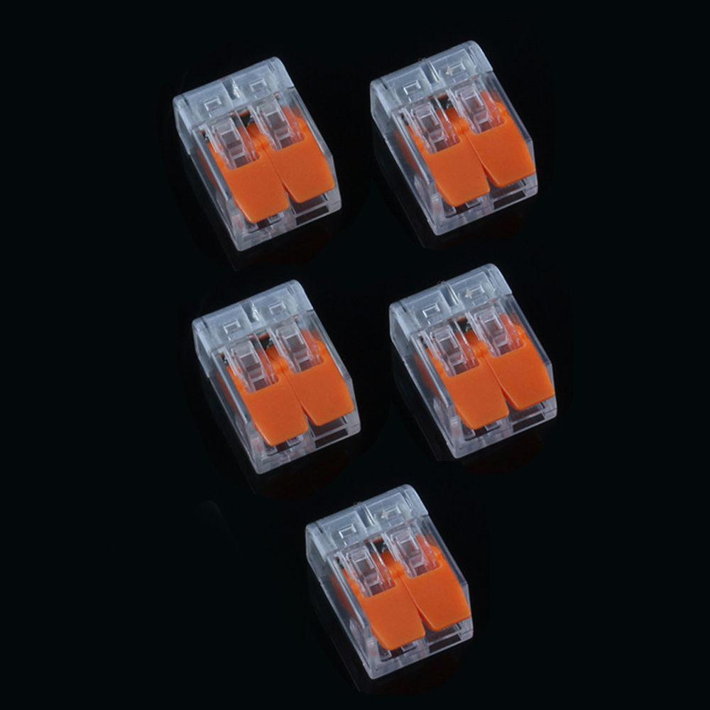 32A Spring Lever Push Fit Wire Connectors in clear and orange color, showcasing compact design and lever mechanism.