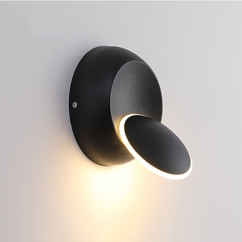 360 Degree Rotate Light Beam Adjustable Wall Lamp in white and black, showcasing its sleek design and adjustable light beam feature.