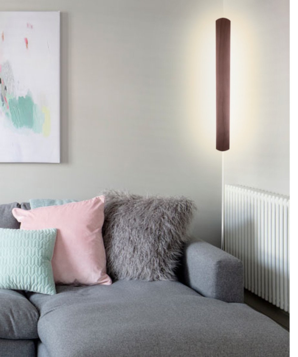 3-inch wide solid wood Hover Plank accent light, 24 inches tall, featuring a medium oak finish, designed for corner or wall installation with a dimmable LED.