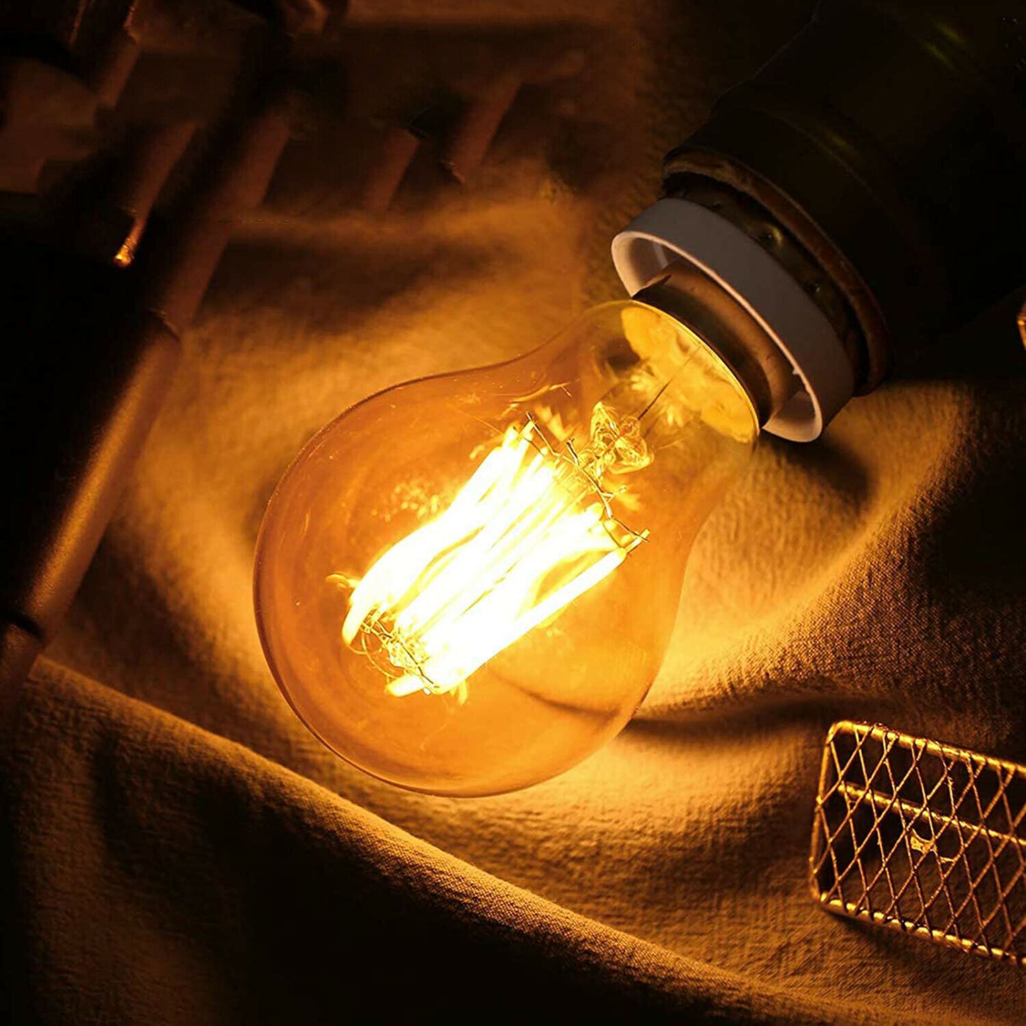 4W LED Light Bulbs A60 E26 Edison Bulb with warm white light, showcasing a classic filament design in a glass body.