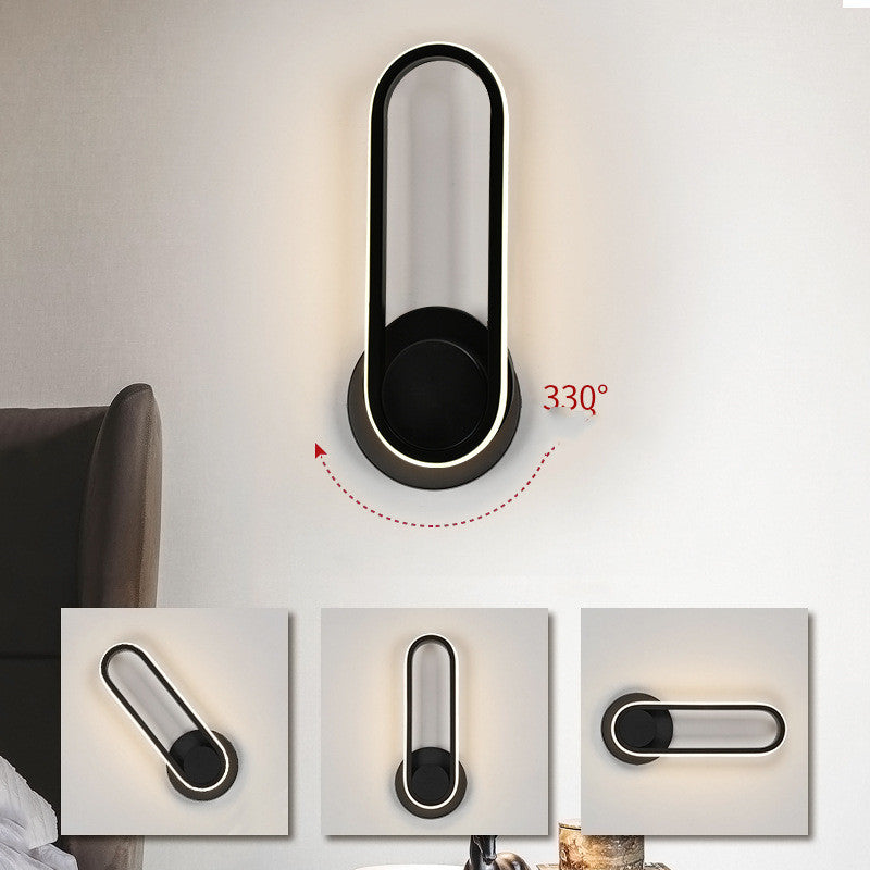 A stylish bedroom wall lamp featuring a rotatable acrylic shade and a sleek metal body, available in black and white.