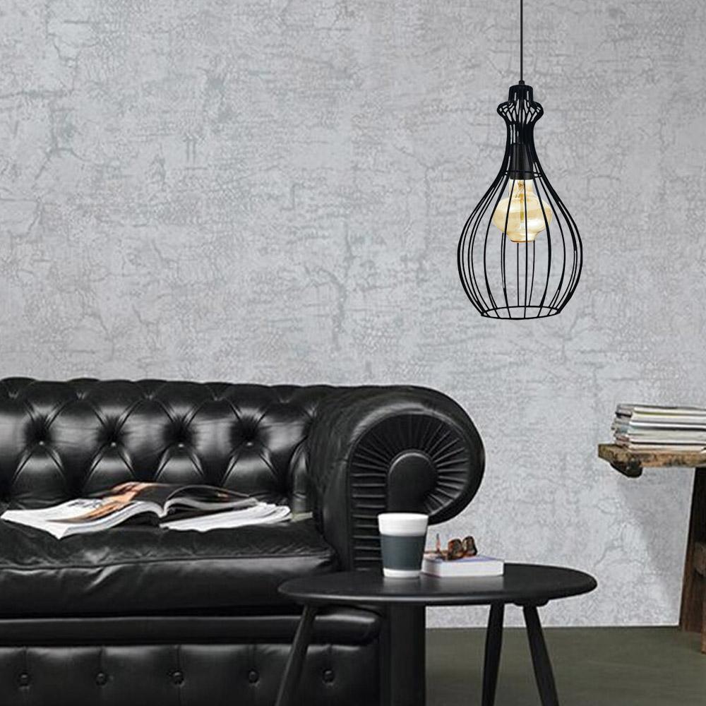 Industrial retro vintage black ceiling pendant light with perforated design, showcasing an elegant and stylish look for home decor.