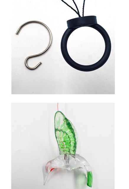 Color Changing Solar Power Wind Chime Crystal Ball hanging in a garden, showcasing vibrant LED colors and a beautiful design.